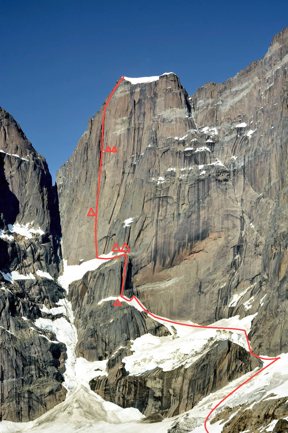 This photo has the team's new route, Metrophobia (7a A2+ 120-degree ice 1700m), marked in red on the west face of Greenland's Apostelens Tommelfinger (2315m).