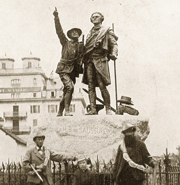 Emile Rey, Katharine Richardson and J.B. Bich at the foot of the statue of Horace Benedict de Saussure and Jacques Balmat, Chamonix, France, 1890. [Photo] Courtesy of the Alpine Club