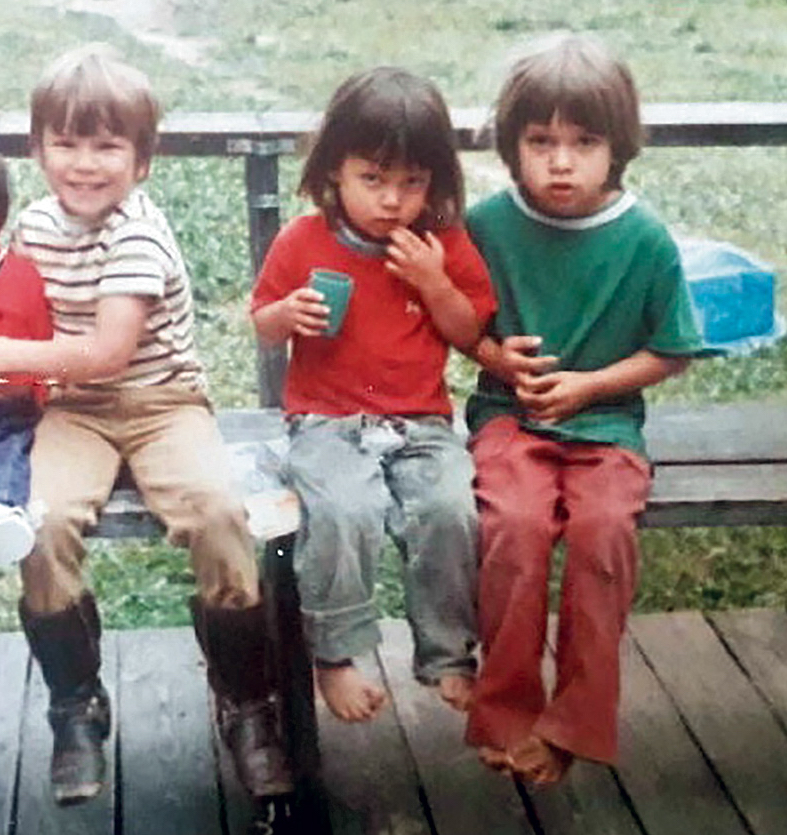Five-year-old Coldiron with his brother, Darrin (center), and cousin. [Photo] Courtesy Scott Coldiron