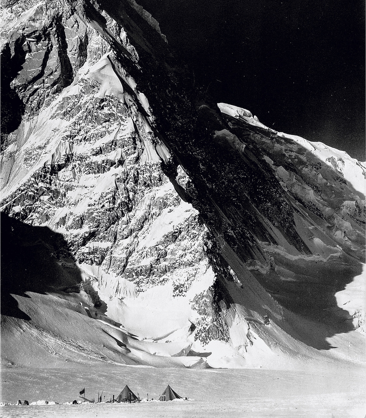 The north buttress of Mt. Kennedy as seen during the 1935 National Geographic Society Yukon Expedition. At the time, Bob Bates wrote that he hoped the peak would be called Mt. Washburn. It was known as East Hubbard until it was renamed for President Kennedy in 1965. In his years as director of the Boston Museum of Science, Washburn hung an enlarged version of this photograph on his office wall. [Photo] Bradford Washburn, Bradford Washburn collection, Museum of Science