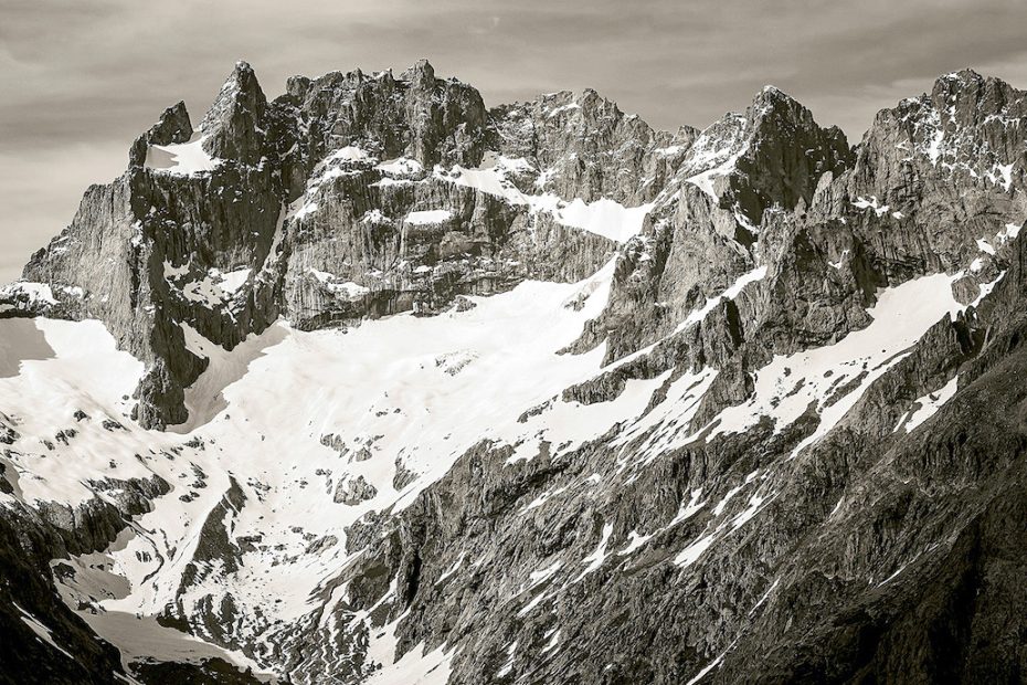 The south face of la Meije (3983m) and the upper Etancons Valley, with the Glacier Carre covered in snow during spring, Massif des Ecrins, France. [Photo] Manu Rivaud