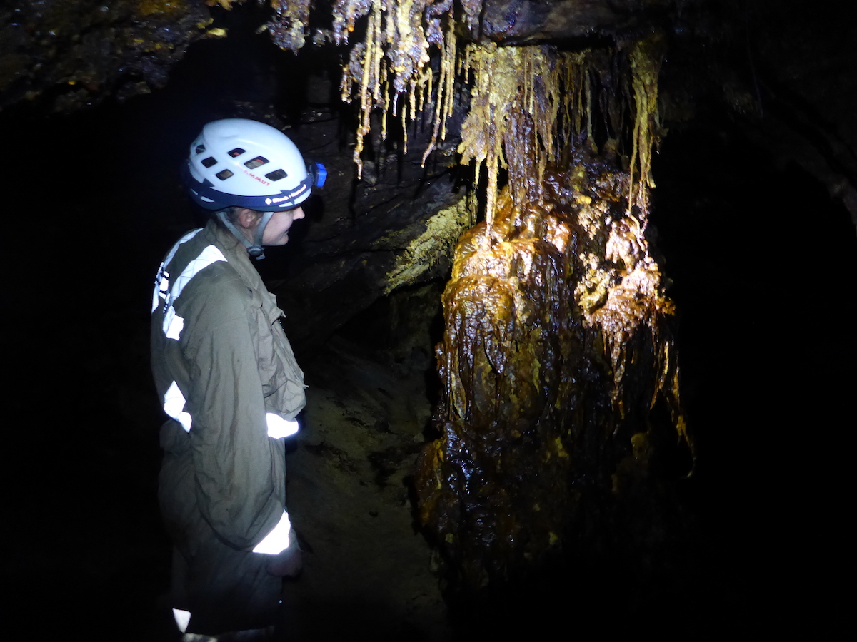 Jane admires some stalactites and stalagmites in the mine during her trip to Cornwall, England, with the author. [Photo] Suzana EL Massri