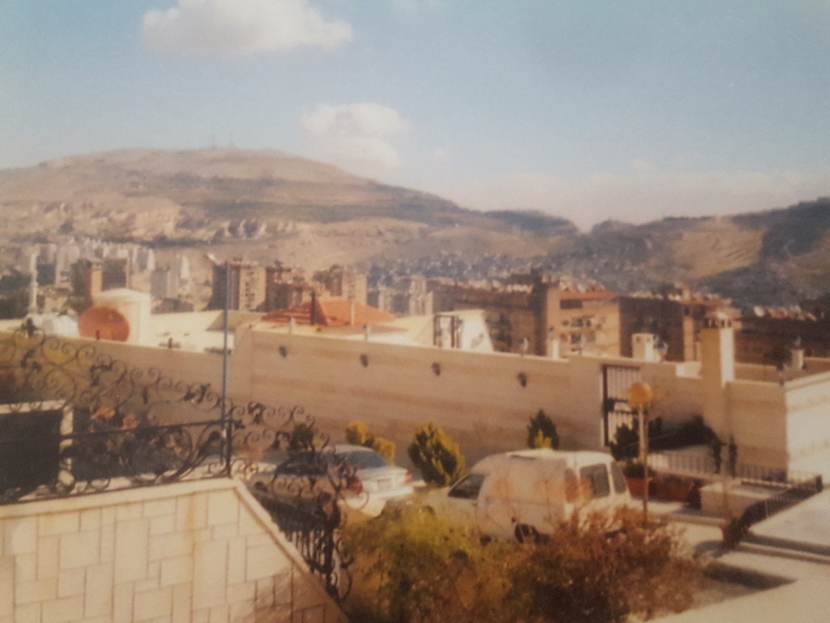 Dummar, Syria, where the author grew up. The hill in the background on the left is Mt. Qasioun and the one partially visible on the right is Mt. Mezzeh. [Photo] Suzana EL Massri family collection