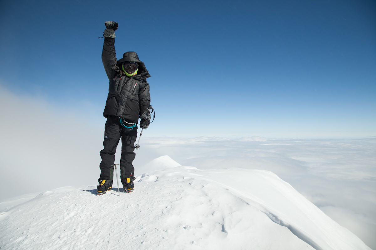 Phil Henderson on the summit of Denali (20,310'), Dena'ina, Upper Kuskokwim and Koyukon Dene land, in the Alaska Range, June 27, 2013. [Photo] Kt Miller