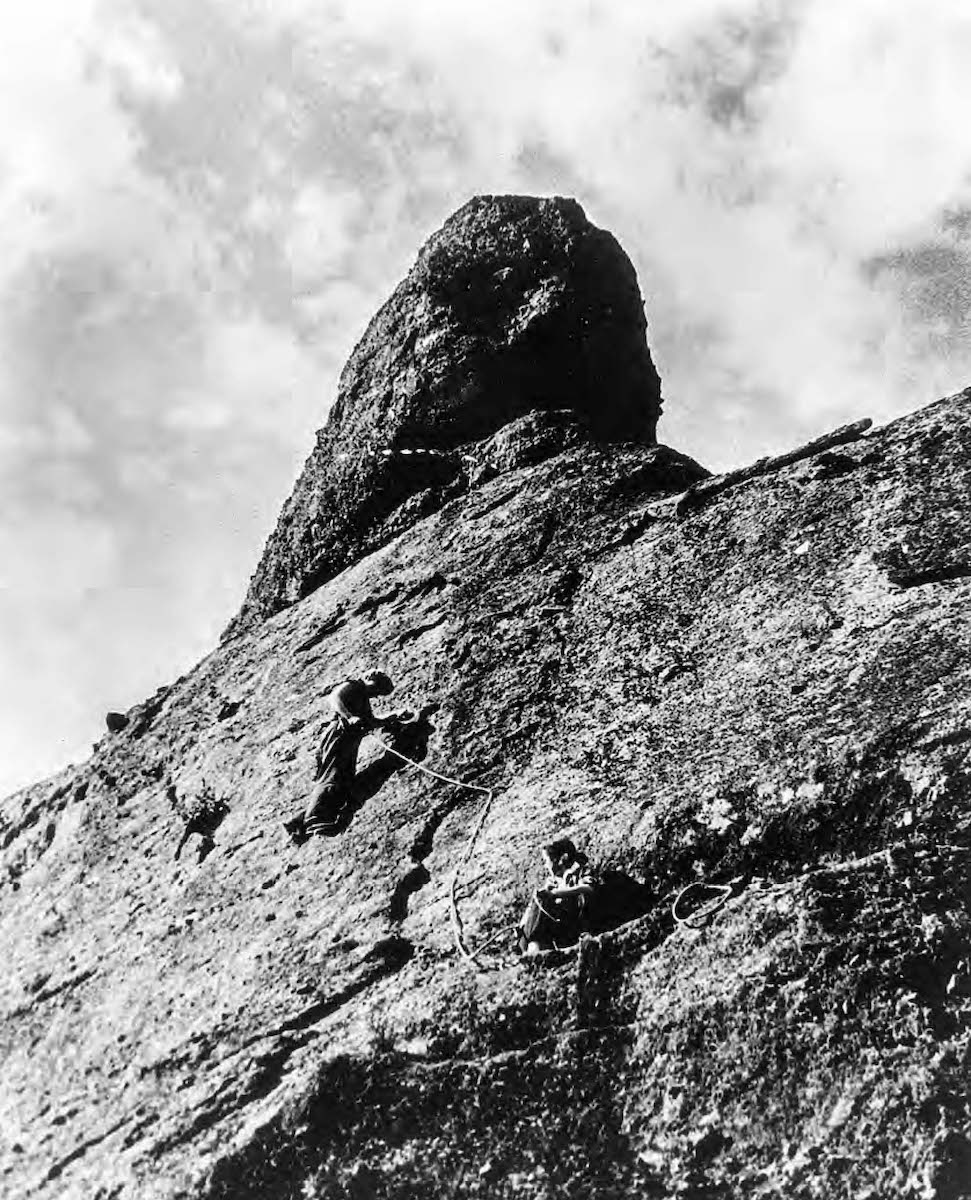 Vogel leads on the Regular Route (5.8) on the Monolith, Pinnacles National Park, California belayed by Sue Wheatland in 1952. [Photo] Richard Irvin