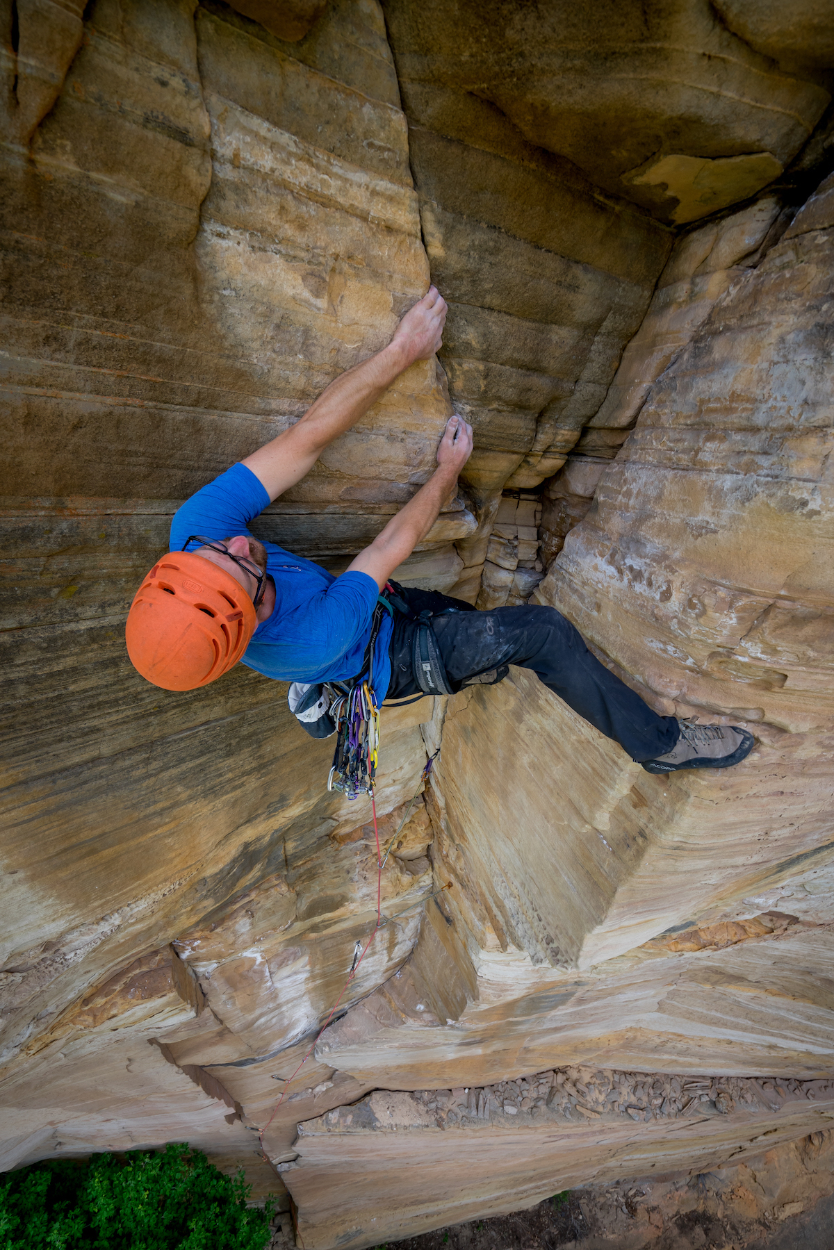 Chris Kalman sporting the Acopa JBs on his and Zach Harrison's new route, Pump Drunk (5.12-, 115') in Northern Arizona's Pumphouse Wash (ancestral homelands of Pueblo, Sinagua, Hohokam, Hopi and Western Apache, among others). [Nelson Klein]
