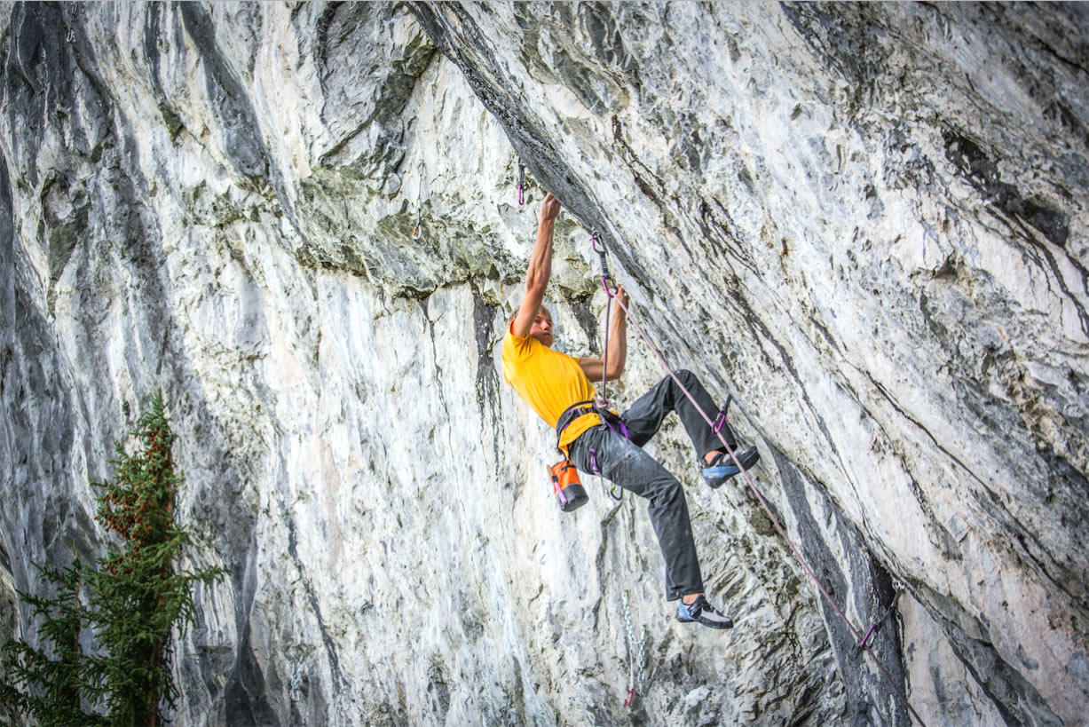 Alex Megos gets a grip on Fight Club (5.15b) at Raven's Crag near Banff, Canada. Megos made the first ascent of the route in August, establishing the country's first 5.15 as well as the second 5.15b in all of North America. A few days later Megos flashed The Path, a 5.14 R trad route. [Photo] Sonnie Trotter
