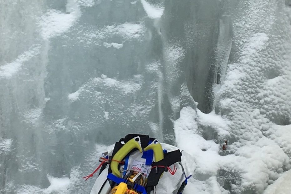 The Alpine Luddites White Light/White Heat backpack with crampons and ice tools strapped to the outside. [Photo] Paula Wright