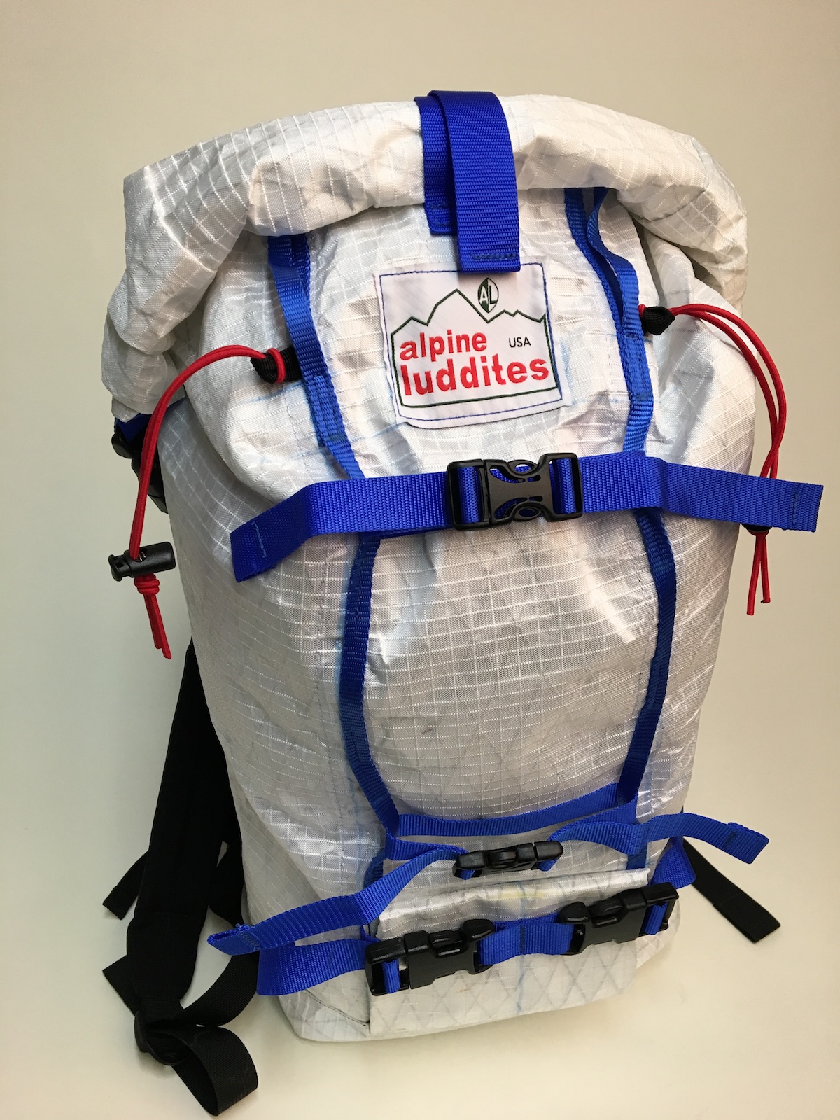 Here the pack's roll-top closure is sealed and strapped down tight. [Photo] Paula Wright