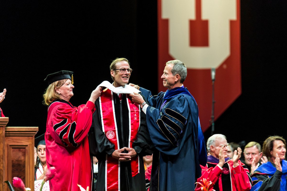 Anker being hooded and for an honorary doctorate degree. [Photo] University of Utah-Marketing and Communications