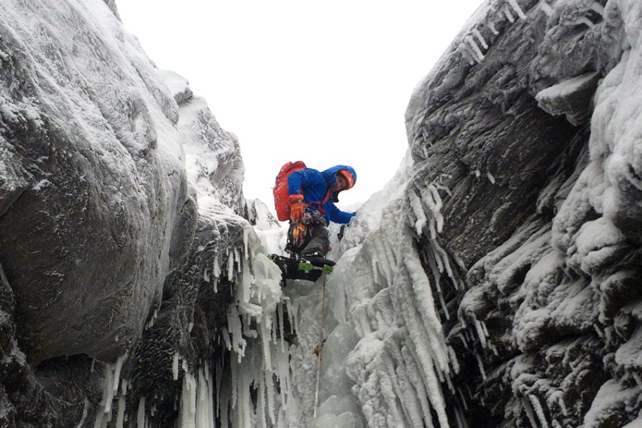 The author climbing Hidden Gully (WI3-4, 650'), Smugglers' Notch, VT in early-season. [Photo] Sam Fox Knapp