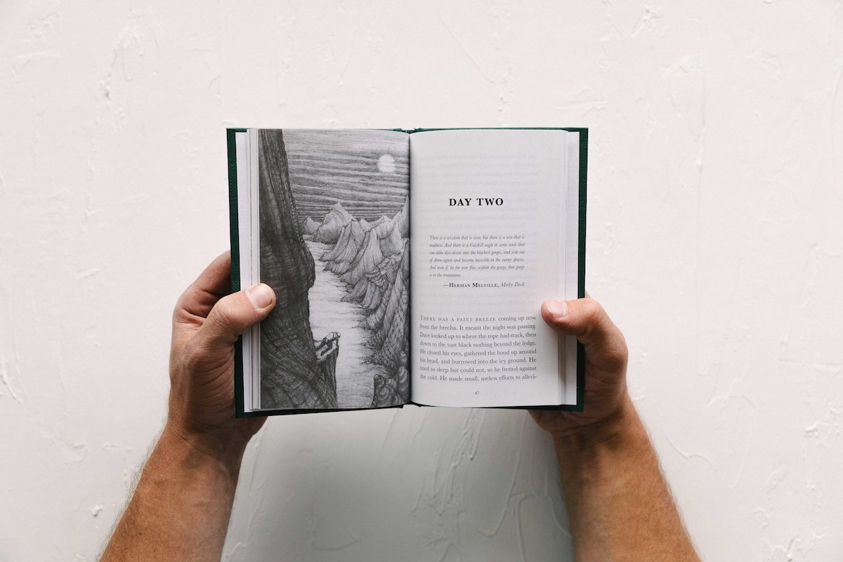 As Above, So Below is a hand-size hardback book with illustrations by Craig Muderlak. [Photo] Jimena Peck