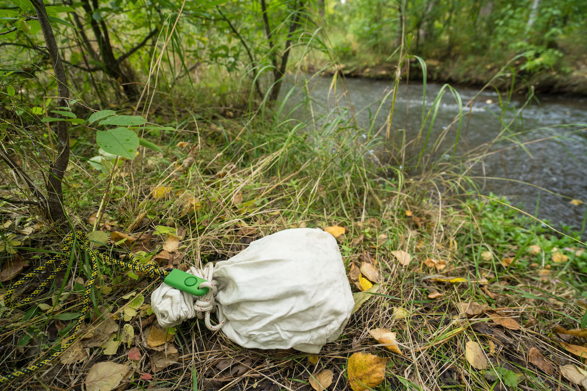 The BASU eAlarm can be used in a variety of ways. Here it is rigged on a food sack so that it will be set off if an animal were to tamper with it. [Photo] Clint Helander