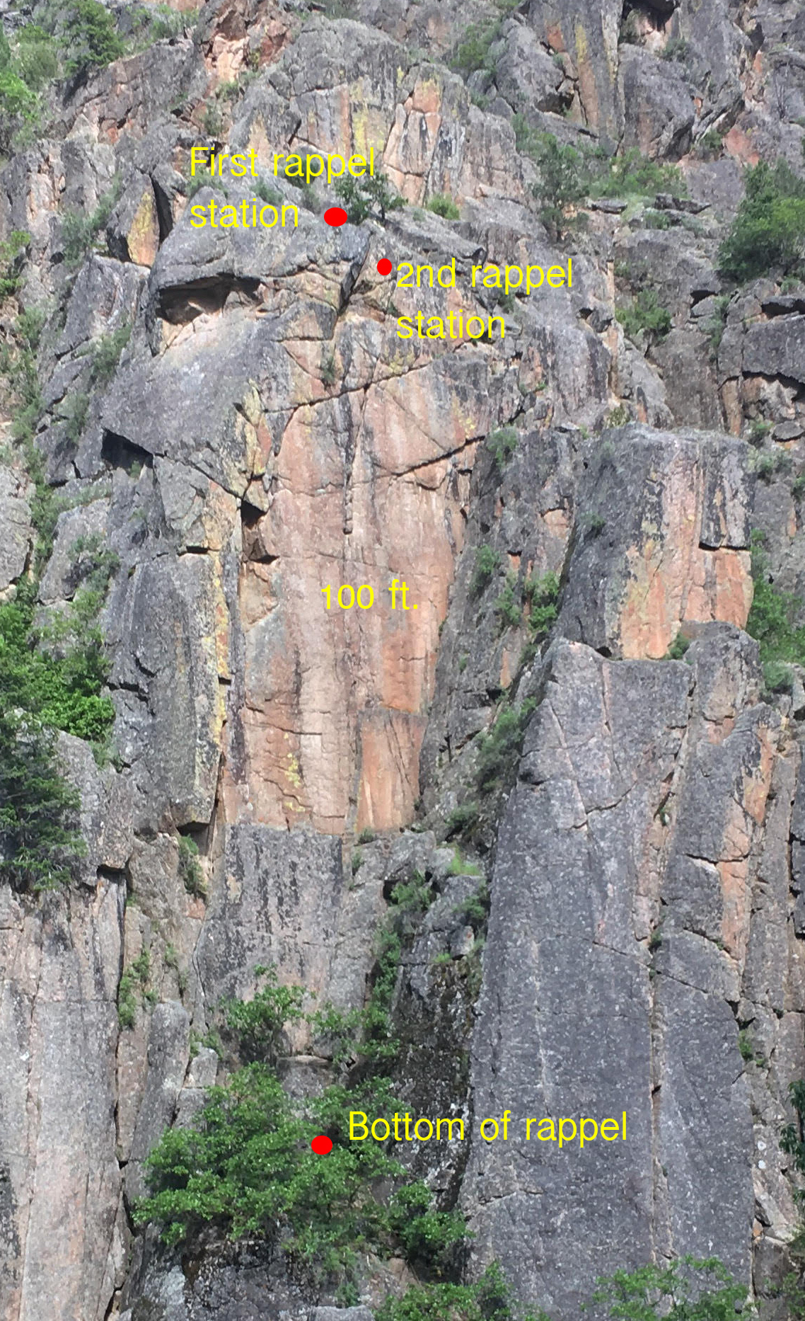 Overview of the Pink Face in No Name Canyon near Glenwood Springs, Colorado: The highest red dot indicates the location of the first rappel where the Escaper failed to activate. The second dot marks the second, free-hanging rappel station. [Photo] Derek Franz