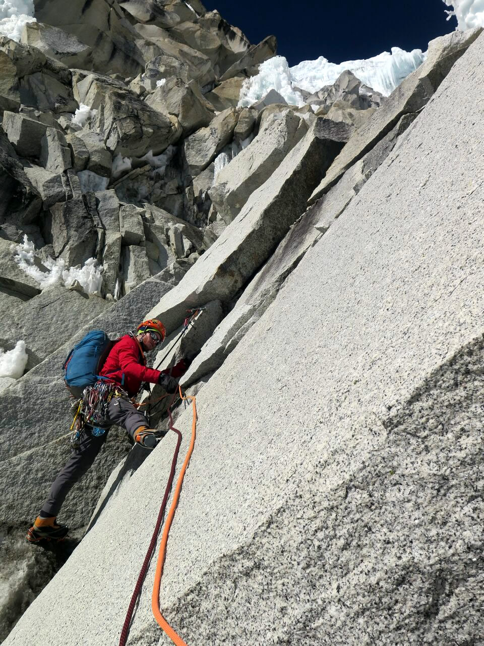 Ben Dare leading the first pitch of mixed terrain on the peak's upper north face. [Photo] Steve Skelton