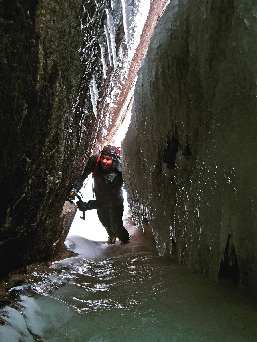 Mike Garity exploring one of the tucked-away ice climbs on Mt. Webster.
