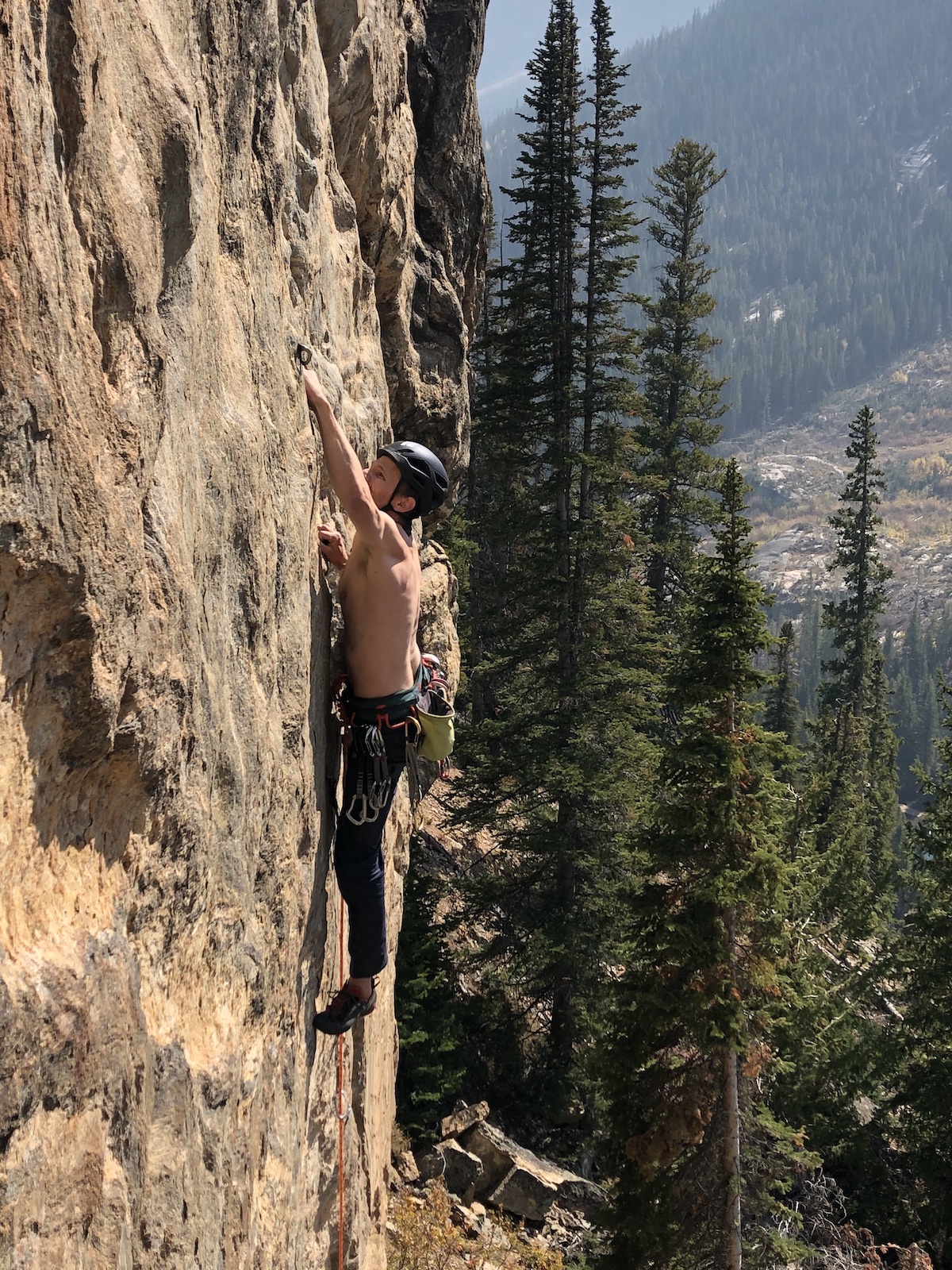 Derek Franz stays relaxed wearing the Black Diamond Vision MIPS helmet while onsighting Rock Candy (5.12a), a thin slippery route on Independence Pass, Colorado. [Photo] Elizabeth Riley