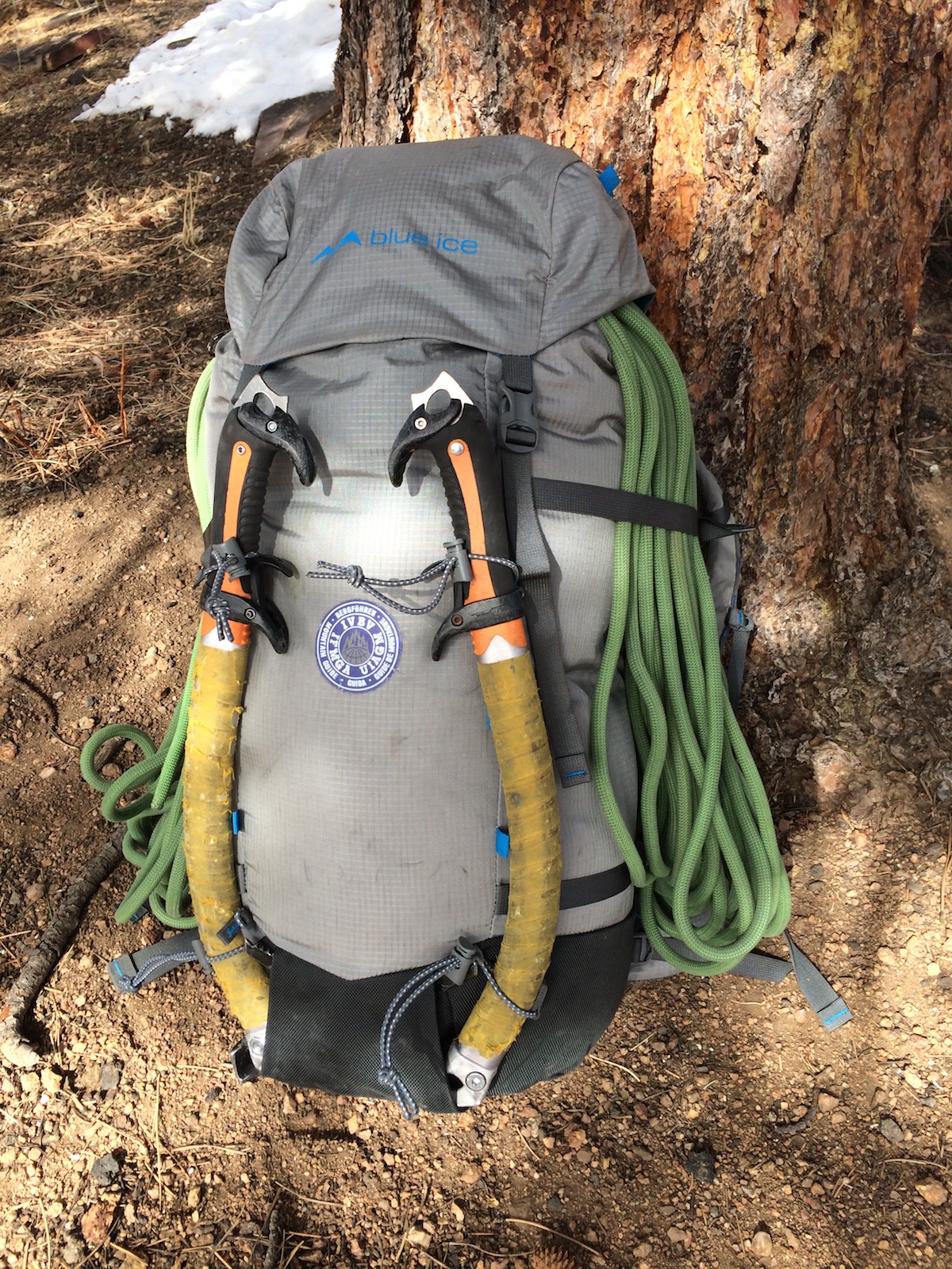The Yeti 50L pack shown carrying two ice tools and a rope. The ice tools are held by bungee cords with plastic toggles. [Photo] Mike Lewis