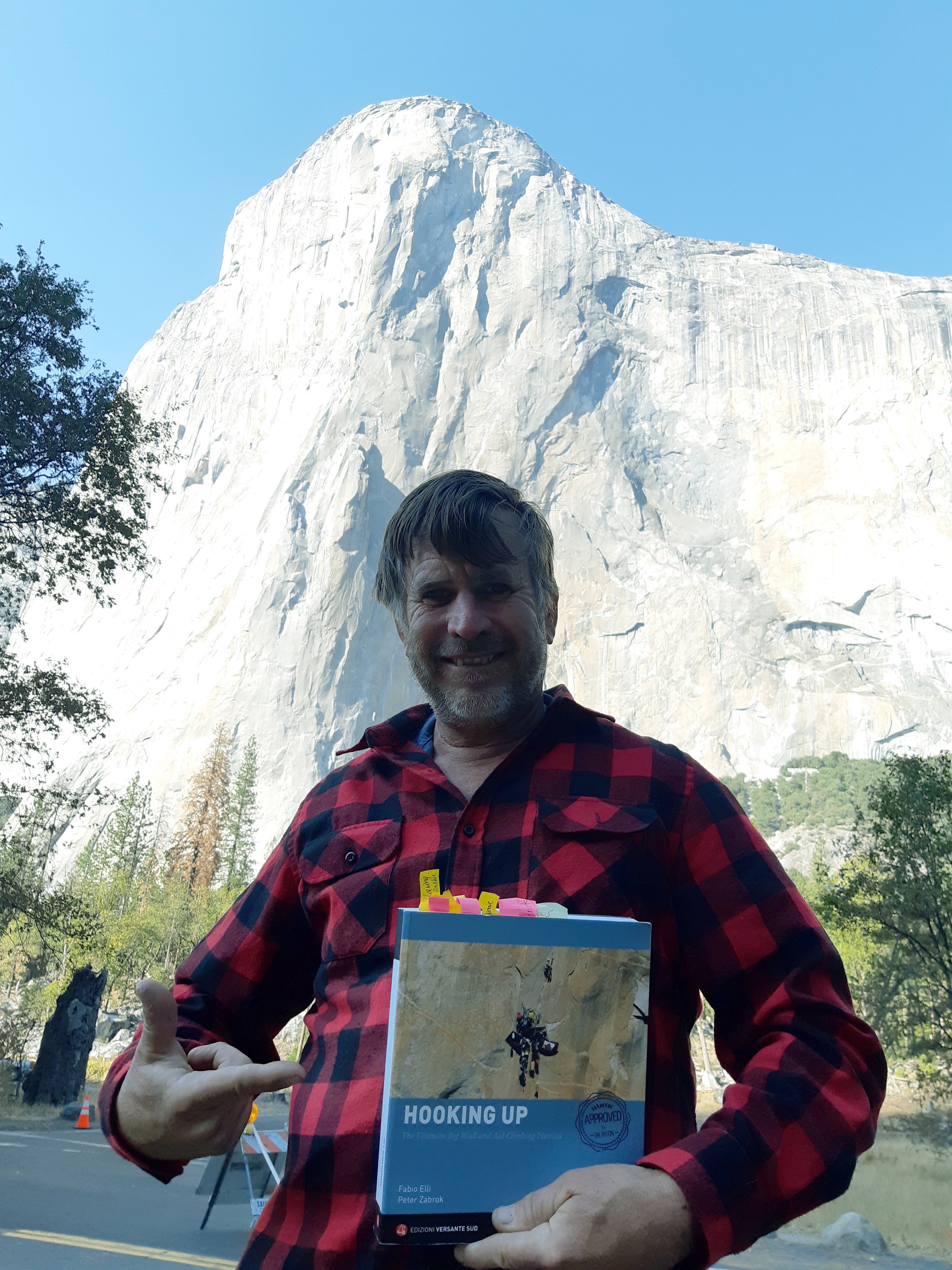 Zabrok with his book below El Cap (Tu-Tok-A-Nu-La). [Photo] Peter Zabrok collection