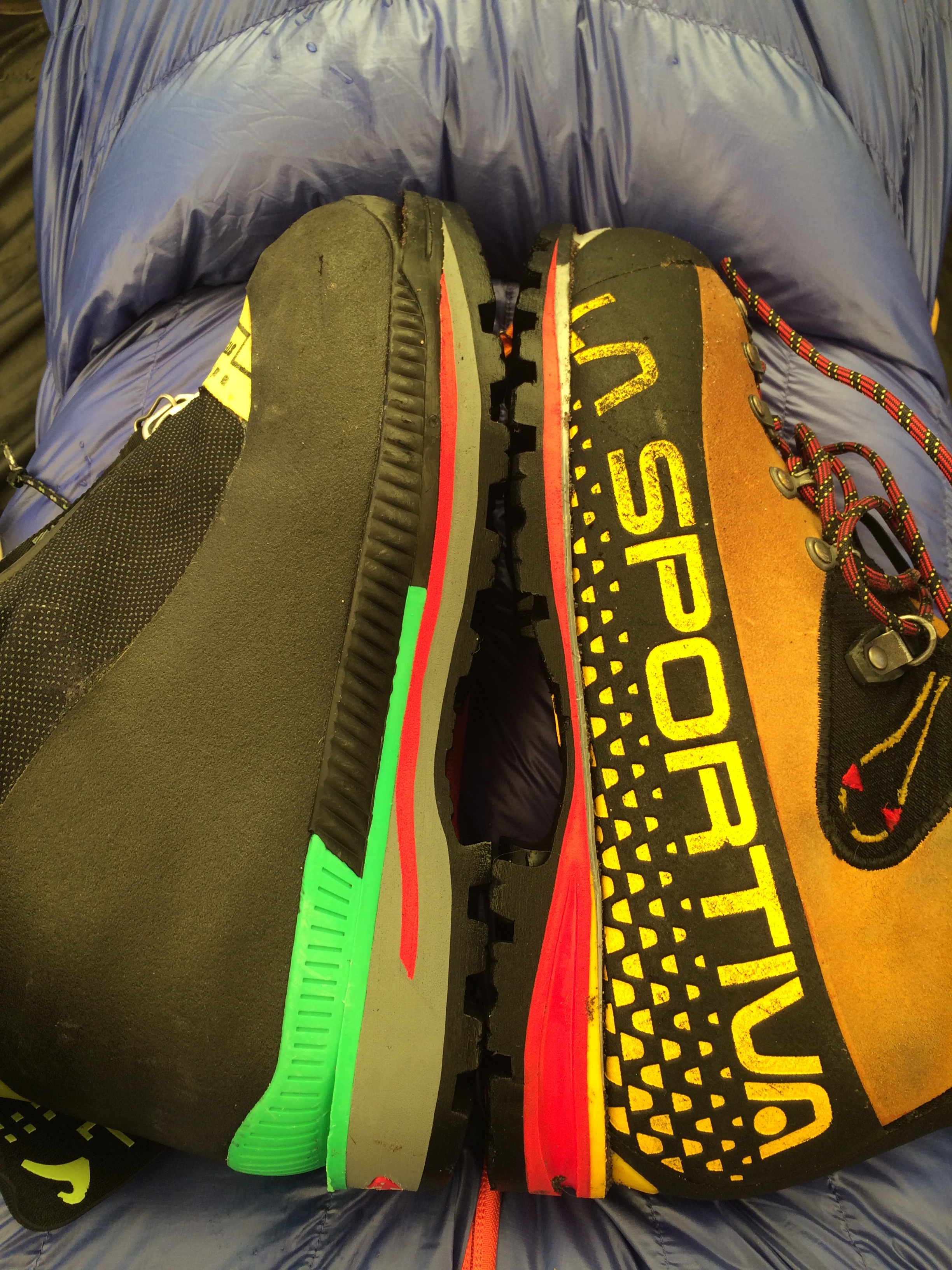 The sole length of the Stetind (left), which fits an American size 9.5 foot, compares to the length of the La Sportiva Nepal Cube, which fits a size 11.5. [Photo] Mike Lewis collection