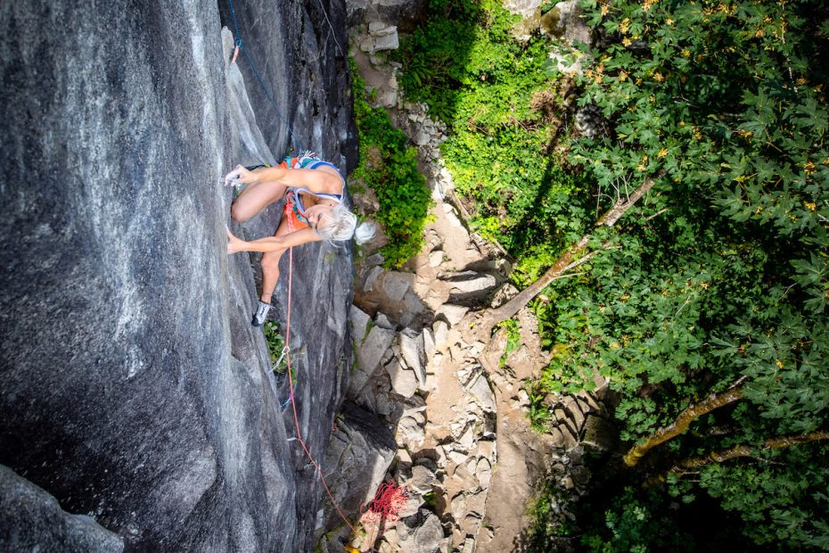 Brittany Goris plugs small gear on the 5.13c/d pitch of City Park, Index, Washington. [Photo] Truc Allen