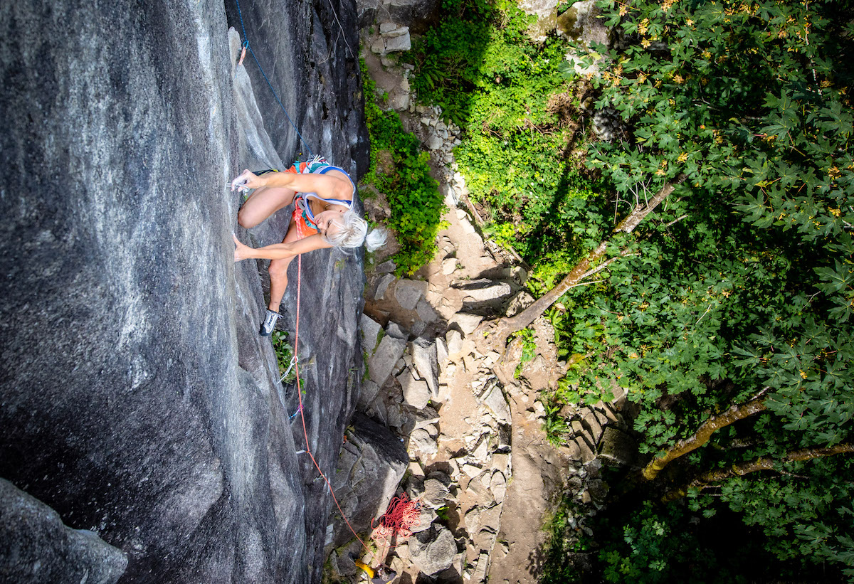 Brittany Goris plugs small gear on the 5.13c/d pitch of City Park, Index, Washington. [Photo] Truc Allen