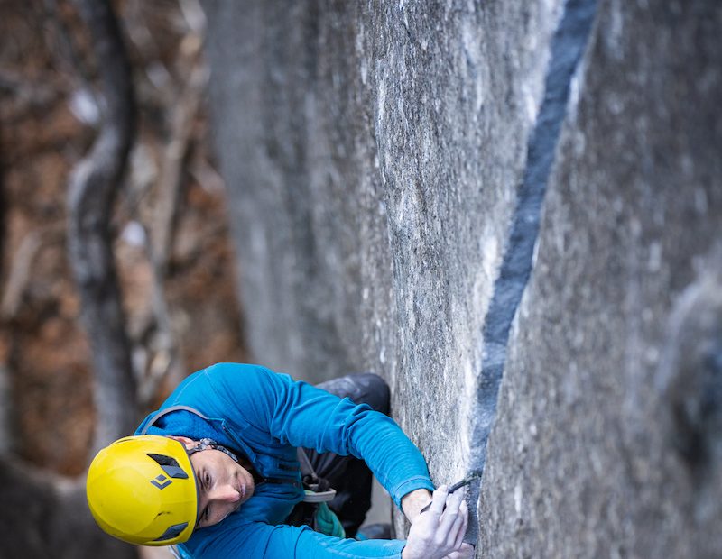 Carlo Traversi places protection on Magic Line (5.14c), Yosemite Valley. [Photo] Christian Adam / Black Diamond