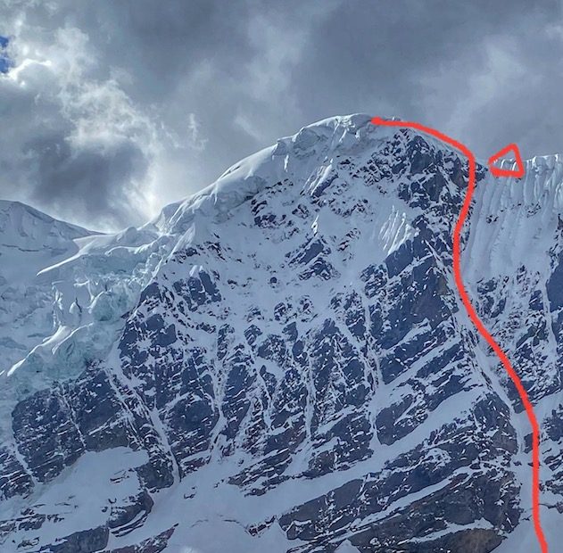 The line of Cerveza, Pan y Acido (ED: 90 degrees, 700m) on the south face of Concha de Caracol (5640m) with the location of the open bivy marked near the top. [Photo] Courtesy of Anna Pfaff