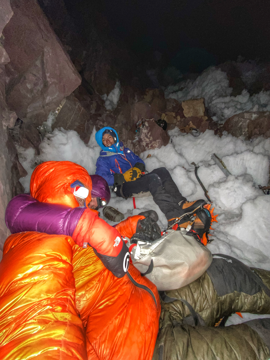 Bundling up for an open bivy at 5500 meters. [Photo] Courtesy of Anna Pfaff