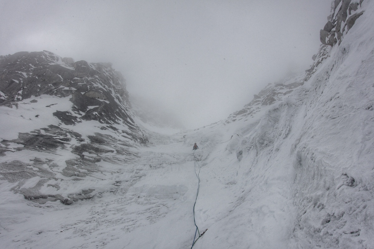 John leading during our first day of climbing. Weather started to change. [Photo] Benjamin Billet