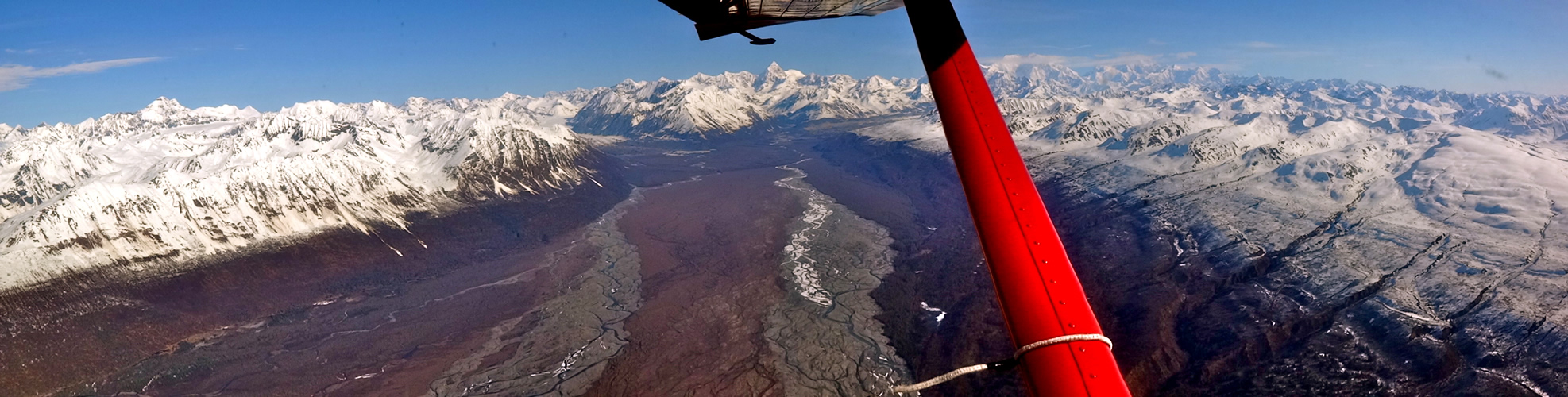 Panorama from the bushplane window of the Alaska Range (the Great Range) [Photo] Benjamin Erdmann