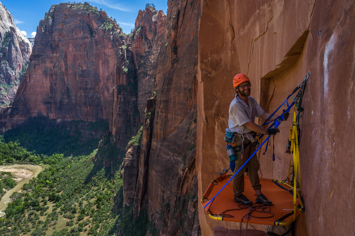 Chris Kalman enjoying the comfort of the D4 Octapod portaledge at the top of the third pitch of Moonlight Buttress (V 5.12+), Zion National Park. [Photo] Nelson Klein
