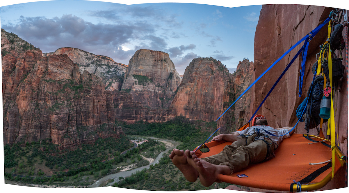 Kalman settling in for a long comfy night on the D4 Octapod portaledge. You can see that the 5-foot-5 Kalman's feet are hanging off the end. While short, the unique shape of the ledge accommodates spooning mode. [Photo] Nelson Klein