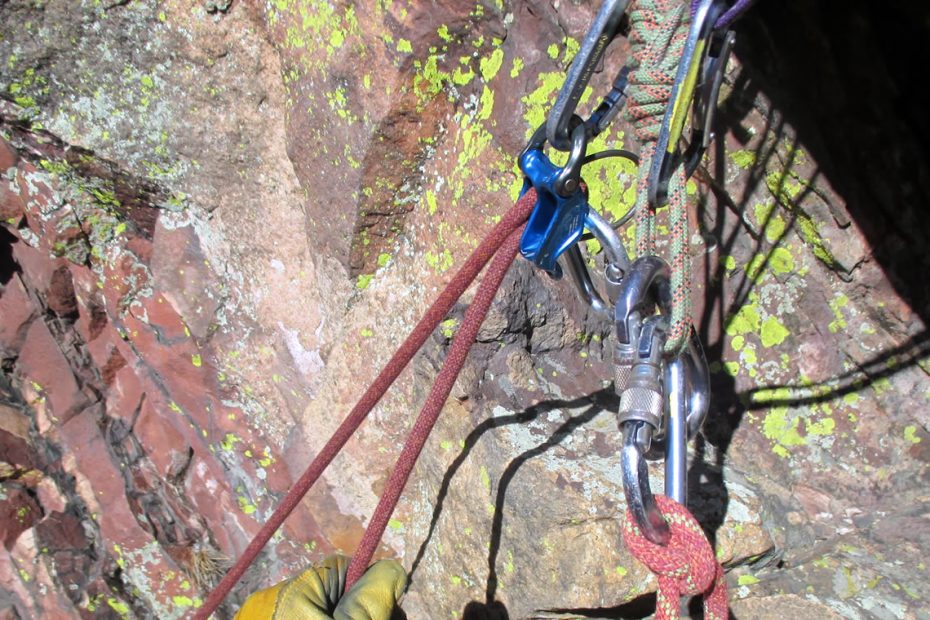 The DMM Pivot is an assisted-braking belay device that works well for top-belaying a climber directly from the anchor, as shown here. [Photo] Peter Braam