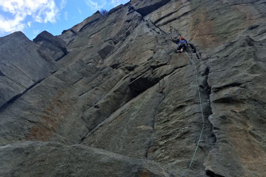 Peter Holben leads Country Club Crack (5.11b/c) at Castle Rock in Boulder Canyon, Colorado, in one 150-foot pitch. [Photo] Chris Van Leuven