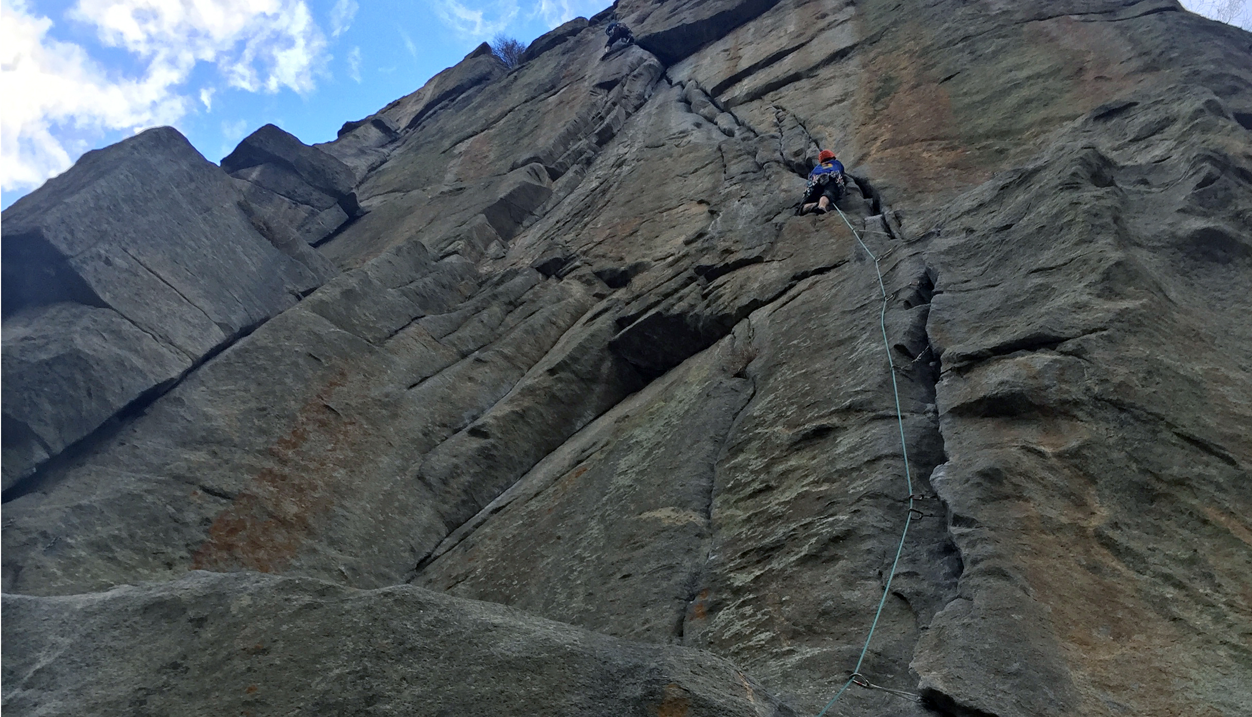 Peter Holben leads Country Club Crack (5.11b/c) at Castle Rock in Boulder Canyon, Colorado, in one 150-foot pitch. [Photo] Chris Van Leuven