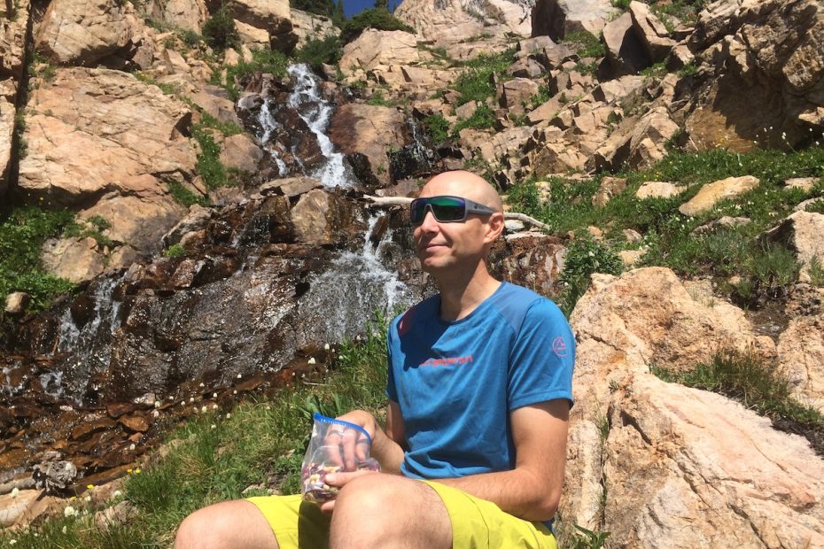 The author takes a snack break off trail in the Indian Peaks Wilderness, Colorado, while wearing the Dragon Alliance Flash LL Ions. [Photo] Catherine Houston