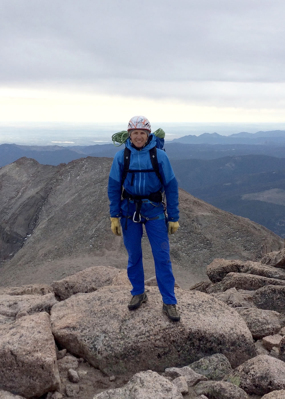 Mike Lewis wearing the Yotei Jacket on the summit of Longs Peak (14,259'), Colorado. [Photo] John Kvederis