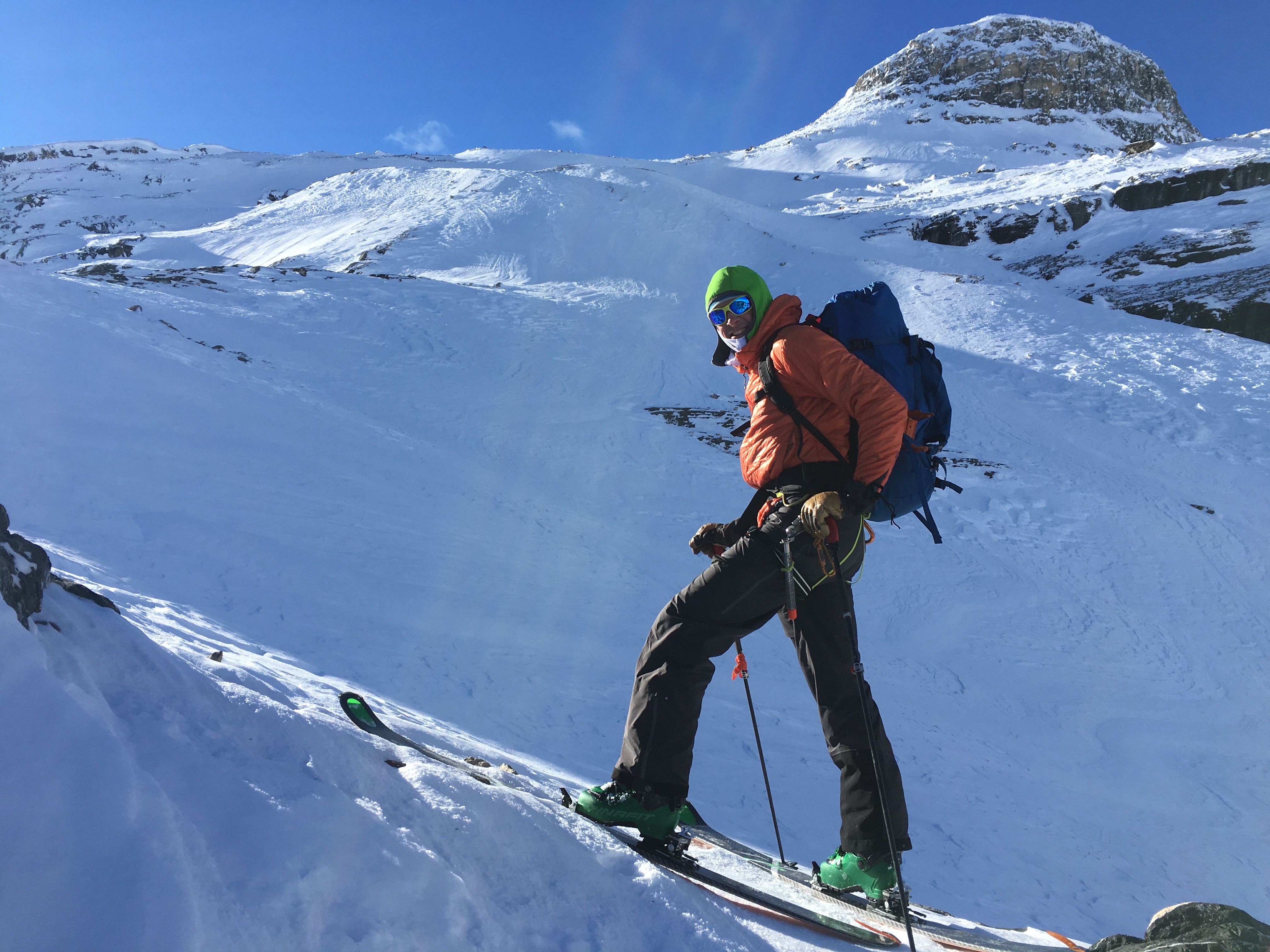 Mike Lewis takes a break in the Canadian Rockies while ski touring with the Yotei Pants. [Photo] Nick Lumby