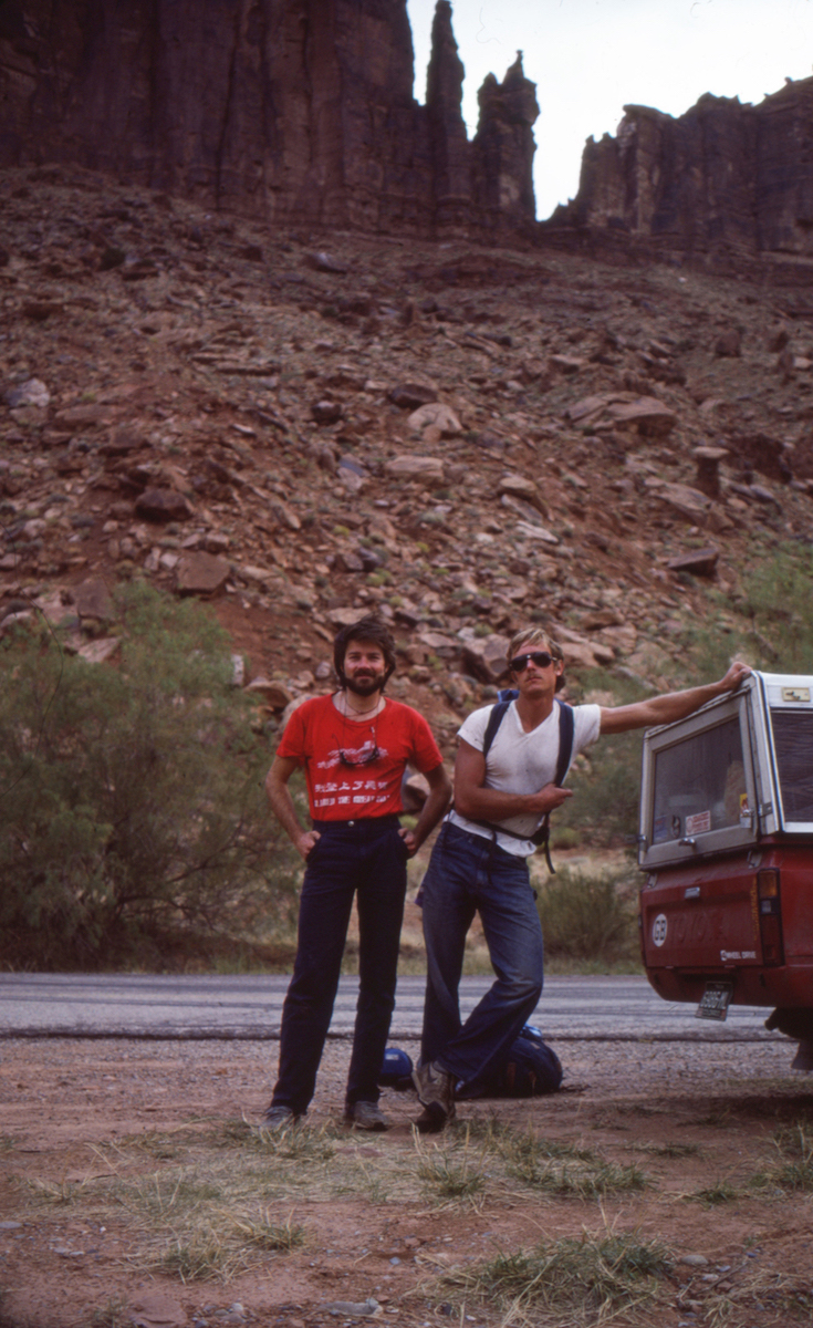 Webster with Jeff Achey before the first ascent of Iron Maiden (5.12) on Lighthouse Tower (center right), River Road, Utah, 1985. [Photo] Jeff Achey