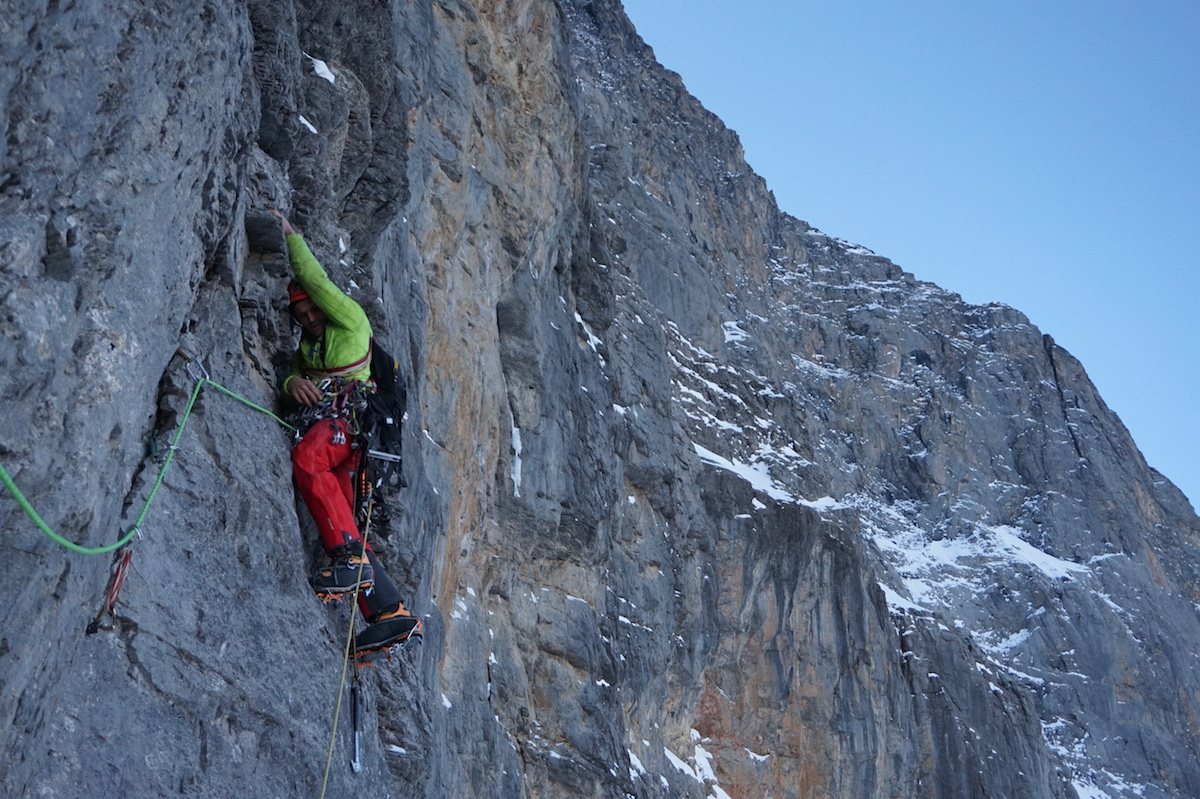 Marcin Tomaszewksi leads a pitch during the first ascent of Titanic (M5 5.10c A3 WI4, 1800m) on the North Face of the Eiger (3970m), which he completed with Tom Ballard on November 30 to December 6. [Photo] Tom Ballard