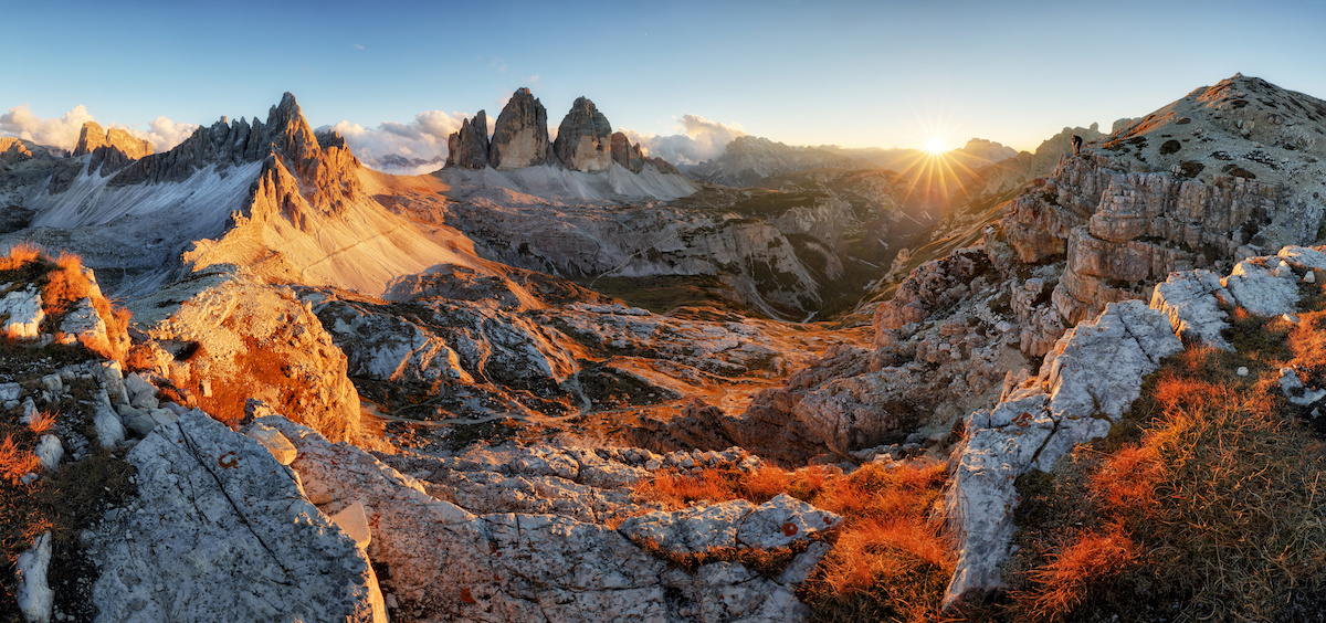 The Tre Cime di Lavaredo (Drei Zinnen) in the Sexten Dolomites of Italy: the tallest peak in the left cluster is the Cima Piccola (Kleine Zinne, 2857m); the Cima Grande (Grosse Zinne, 2999m) is in the middle; and the Cima Ovest (Westliche Zinne, 2973m) is on the right. [Photo] Adobe Stock