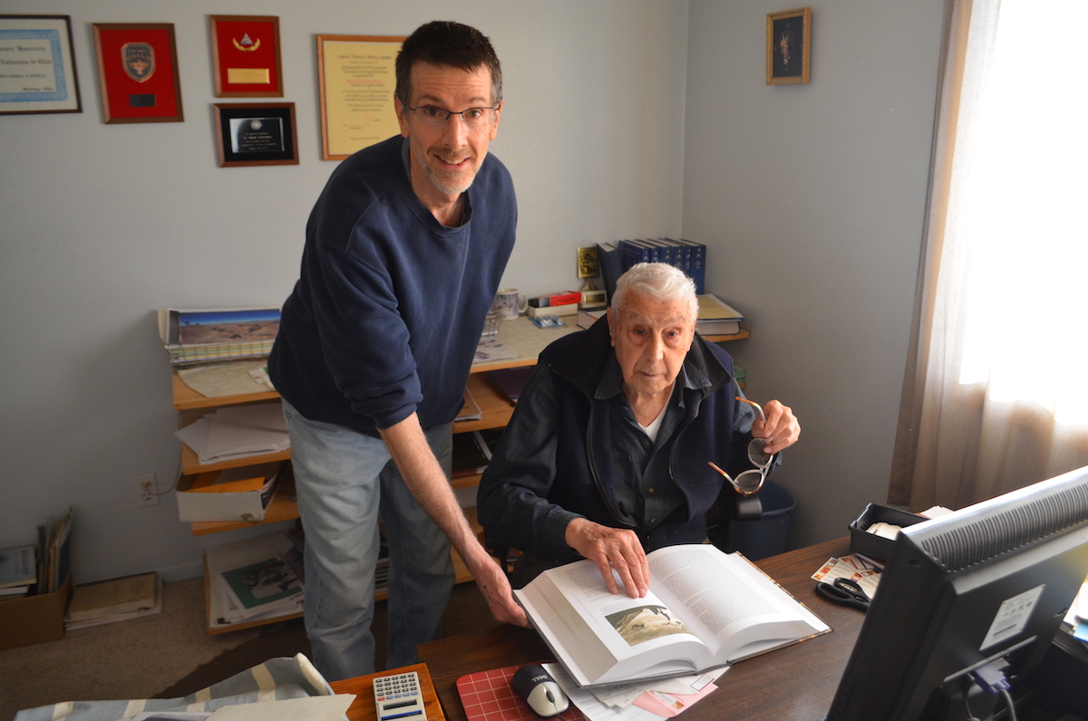 Echevarria (right) in his home office in Loveland, Colorado, October 2018, with his son Felipe. [Photo] Cameron M. Burns