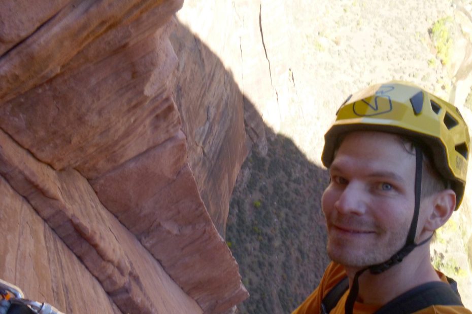 The author wearing the Grivel Stealth Hardshell helmet on the second-to-last pitch of Prodigal Sun in Zion, October 2017. [Photo] Derek Franz