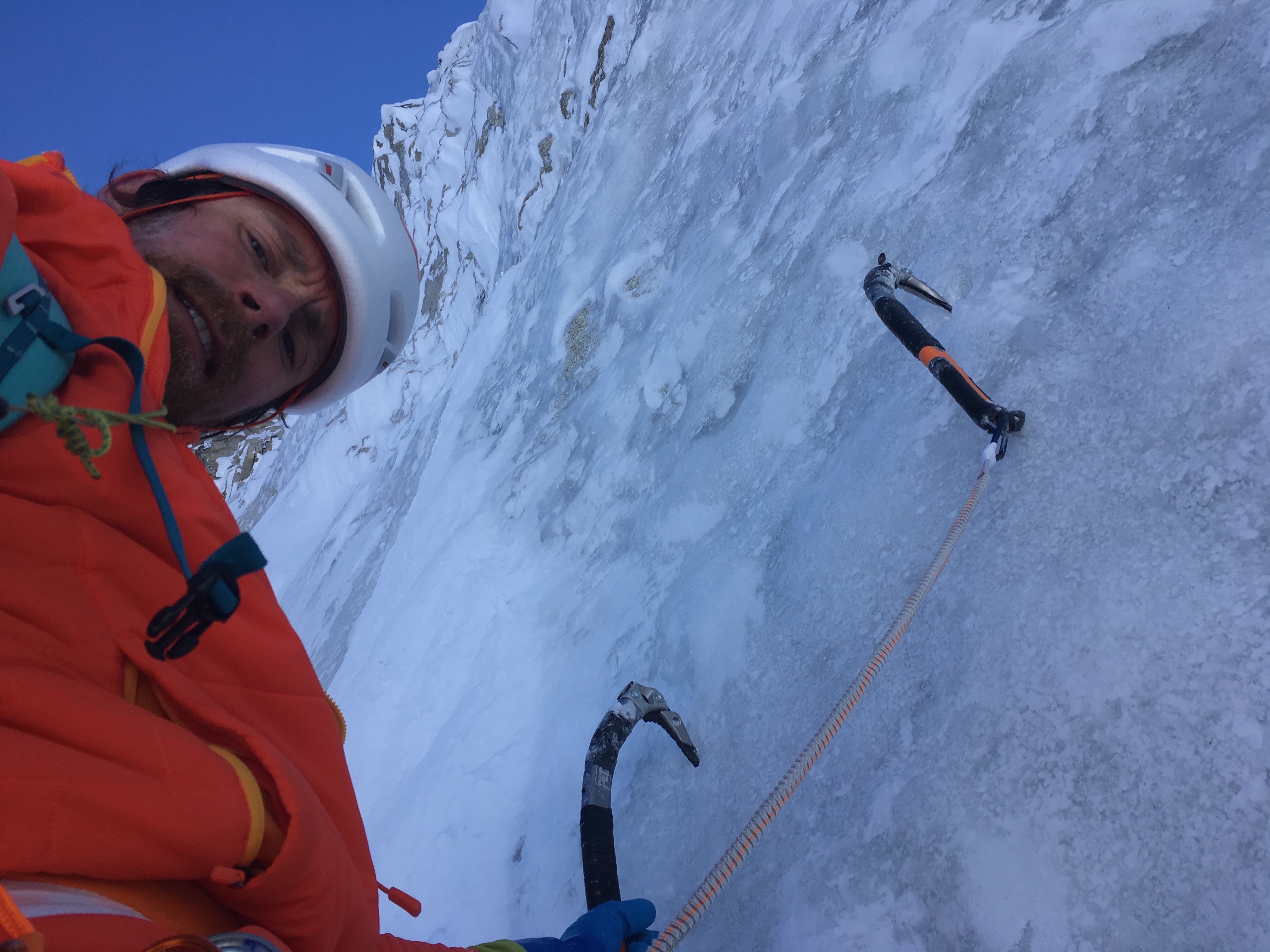 After a long rightward traverse on the second ice band, climbing some moderate ice to join the Bjoernberg-Ireland route. [Photo] Colin Haley