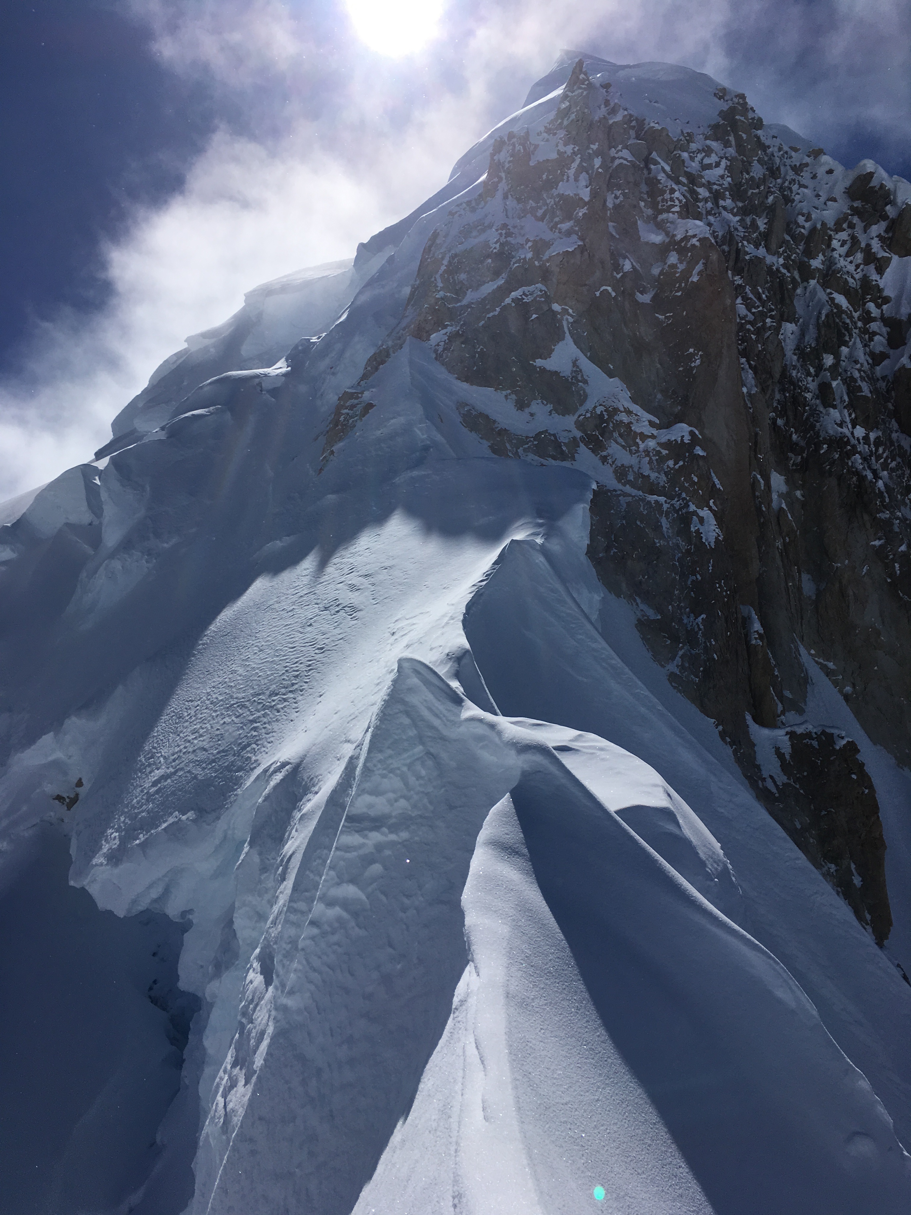 Looking up the upper Northeast Ridge of Begguya, from just past the cornice bivy. [Photo] Colin Haley