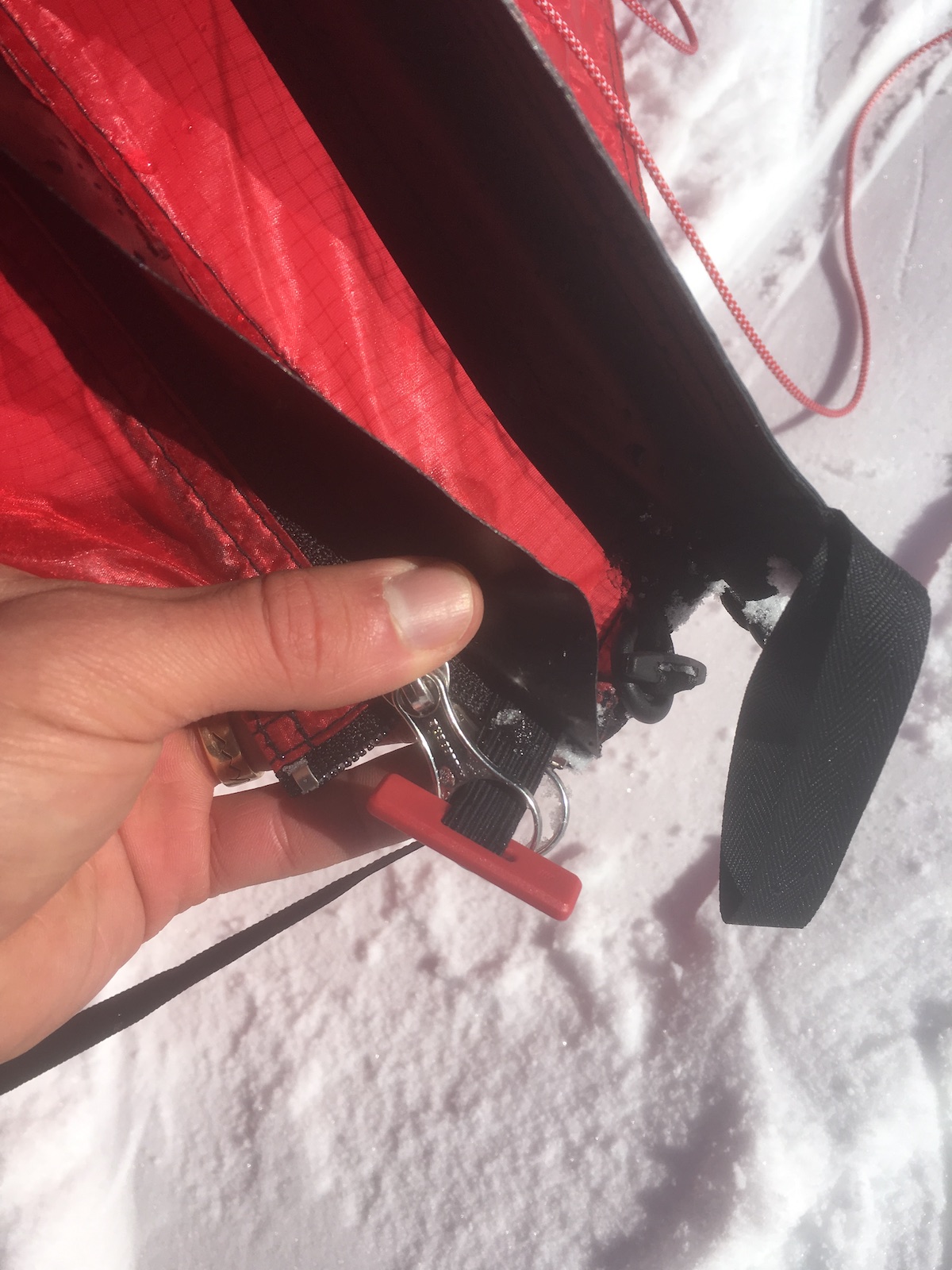 Nifty elastic toggle to keep the zippers shut in wind. [Photo] Drew Thayer