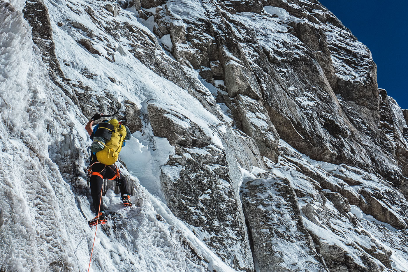 Prezelj crosses the bergschrund on the first morning of the Cerro Kishtwar climb. [Photo] Urban Novak