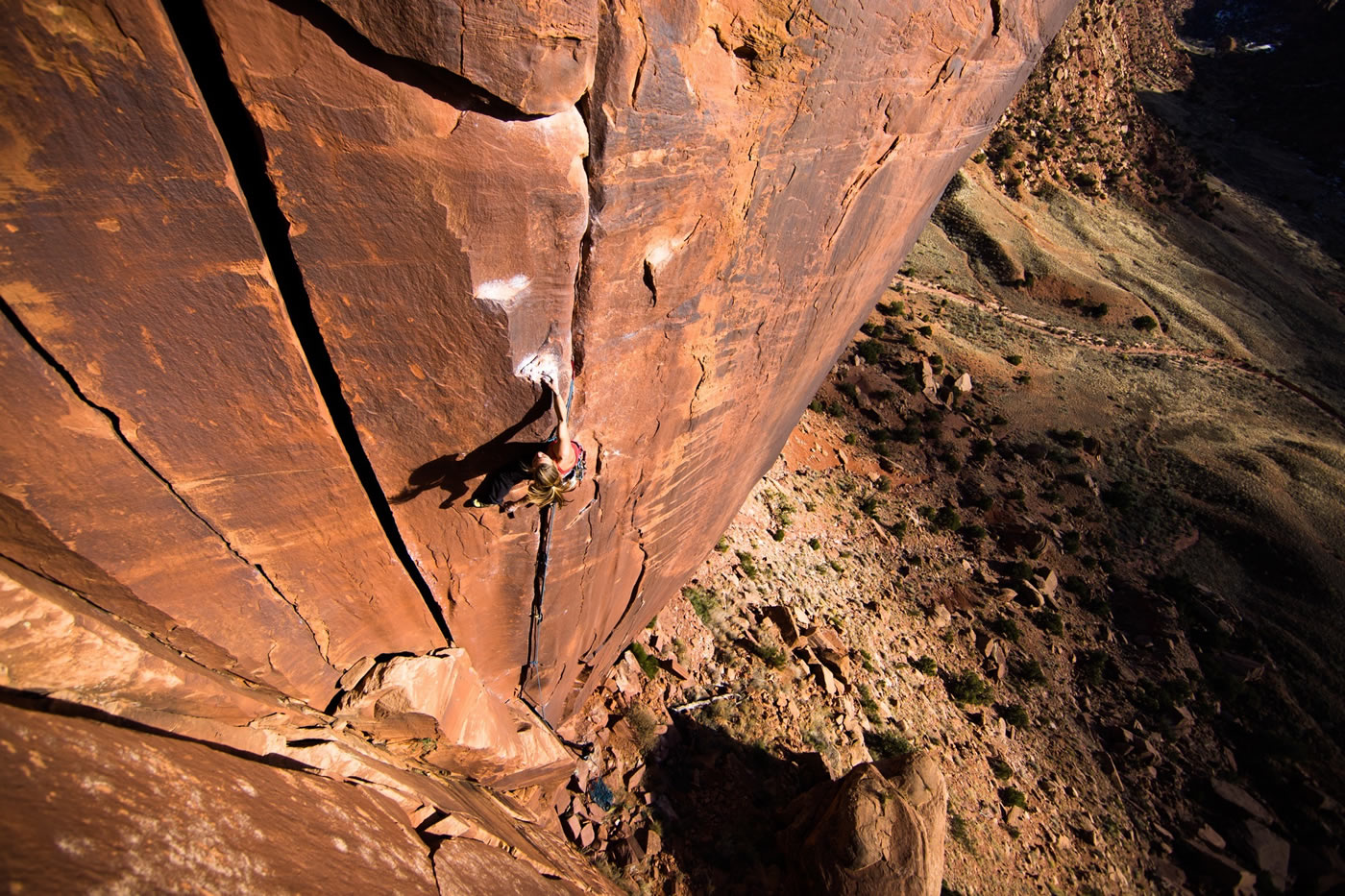 With his camera on his back, Forest led up Wavy Gravy (5.10) to get this shot of me on Mantel Illness (5.11). I knew he'd capture a stunning image, but I didn't know that the sun would be so perfectly poised to capture my shadow climbing as well. [Photo] Forest Woodward