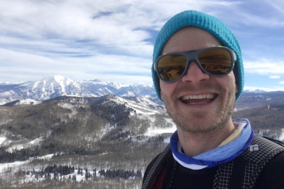 The author enjoys the Julbo Explorer 2.0 sunglasses on a backcountry ski run in Colorado. Mt. Sopris (12,966'), left, Capitol Peak (14,131') and other summits in the famous Elk Range are visible in the background. [Photo] Derek Franz